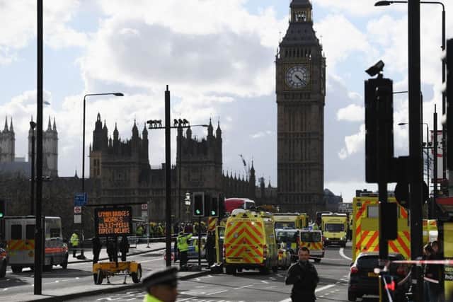 Ambulances, police vehicles and emergency services seen on Westminster Bridge. Picture: Getty Images