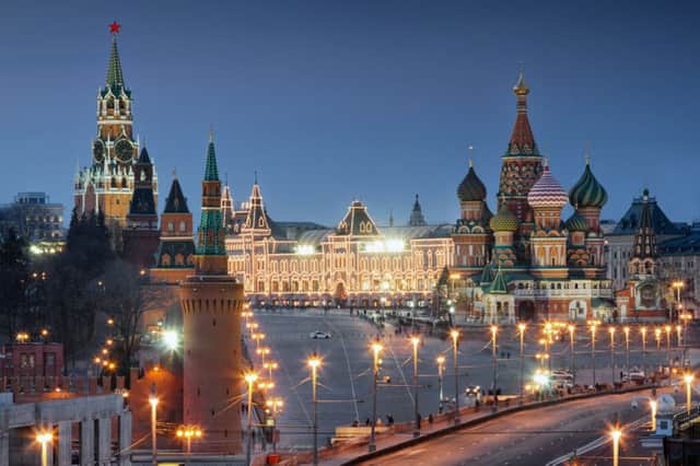 View of the Kremlin, St Basils Cathedral and department store GUM in Red Square