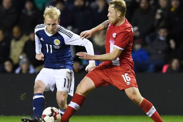 Scotland's Steven Naismith in action against Canada's Scott Arfield. Picture: Paul Devlin/SNS