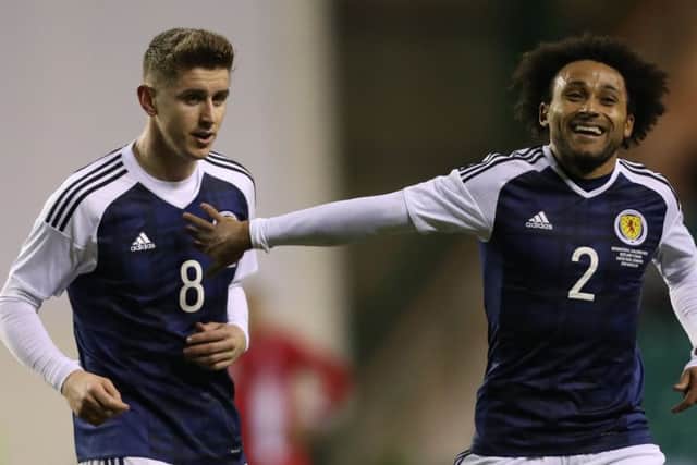 Tom Cairney, left, pictured alongside Ikechi Anya, impressed on his Scotland debut. Picture: Ian MacNicol/Getty Images