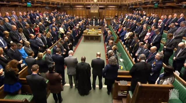 Members of the House of Parliament observe a minutes silence (Photo: PA Wire)