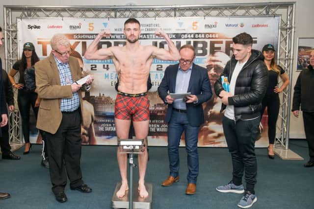Josh Taylor weighs in ahead of his bout with Warren Joubert. Picture: Ian Georgeson.