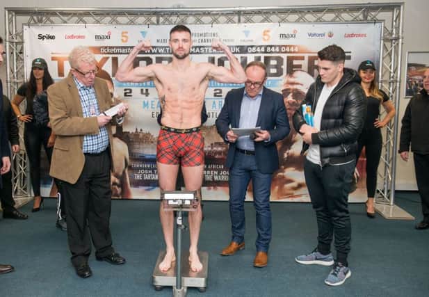 Josh Taylor weighs in ahead of his bout with Warren Joubert. Picture: Ian Georgeson.