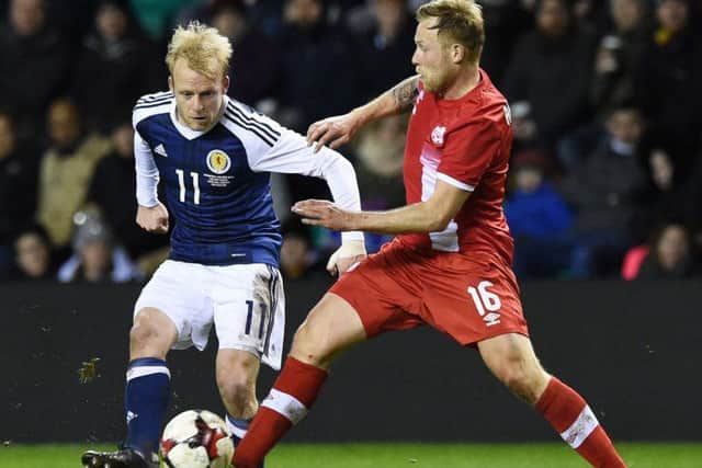 Scotland's Steven Naismith in action against Canada's Scott Arfield. Picture: Paul Devlin/SNS