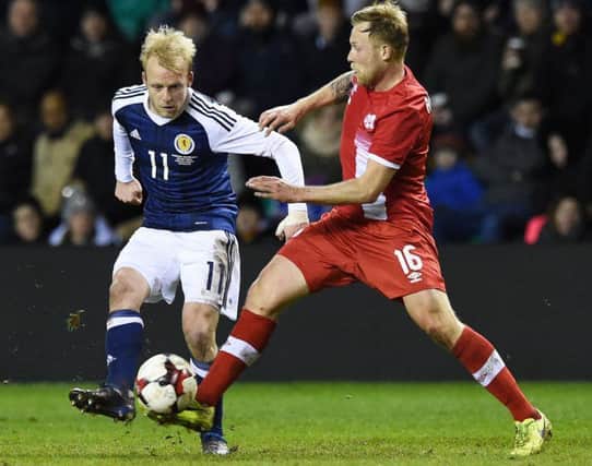 Scotland's Steven Naismith in action against Canada's Scott Arfield. Picture: Paul Devlin/SNS