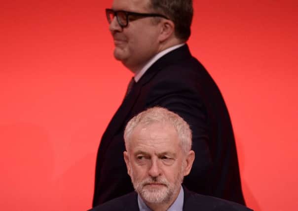 Labour leader Jeremy Corbyn and his deputy, Tom Watson, who has accused supporters of the leader of plotting a left-wing coup. Picture: Oli Scarff/AFP/Getty