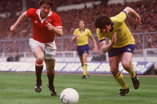 Man United's Martin Buchan, left, and Frank Stapleton of Arsenal chase the ball during the 1979 FA Cup final. Picture: Colorsport/REX/Shutterstock