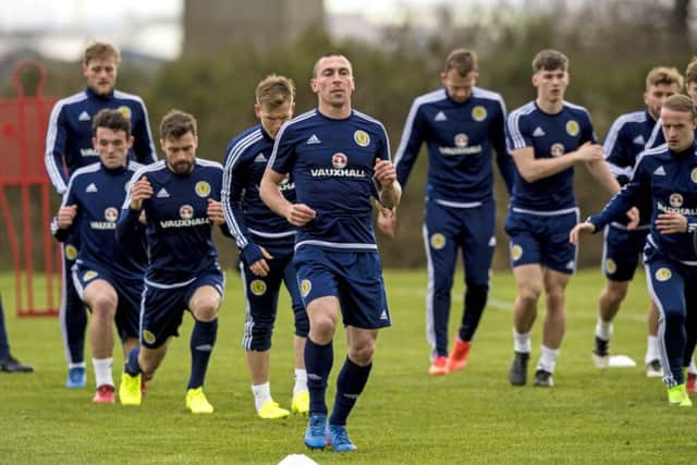 Scott Brown leads the way in training at the Scotland base at Mar Hall. Picture: Alan Harvey/SNS