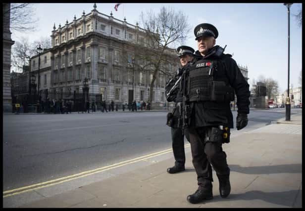 Armed police patrolling Westminster yesterday. Picture: Ben Stevens/i-Images