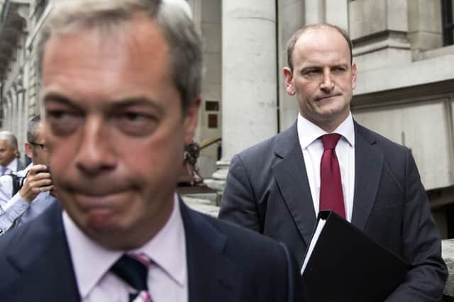 MP Douglas Carswell, right, was not on good terms with Nigel Farage. Picture: Oli Scarff/Getty