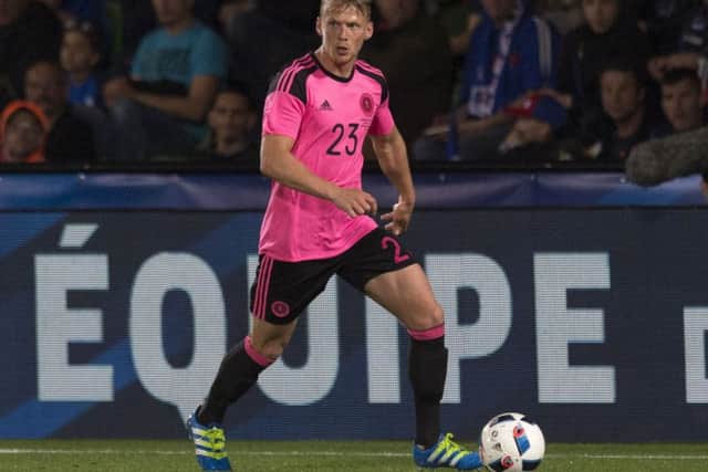 Stephen Kingsley winning his one and only Scotland cap so far in a friendly against France in Metz.  Photograph: SNS