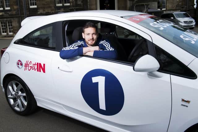Scotland number one Craig Gordon, is pictured with the Vauxhall Corsa. Picture: SNS