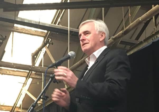John McDonnell addressing the Momentum Conference, in Birmingham where he called for an end to the Labour Party's internal splits and division. Picture: Richard Vernalls/PA Wire