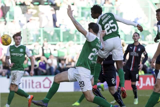 Hibernian's Efe Ambrose scores the opening goal against Falkirk. Picture: SNS