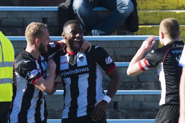 Nat Wedderburn (8) celebrates his goal with team-mates. Picture: Sammy Turner/SNS