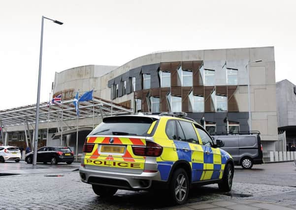 A police vehicle sent to Holyrood after the London attack. Picture: Andrew O'Brien