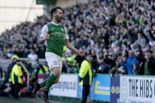 James Keatings celebrates scoring his goal in added time to seal Hibs 2-1 victory over Falkirk. Picture: SNS.