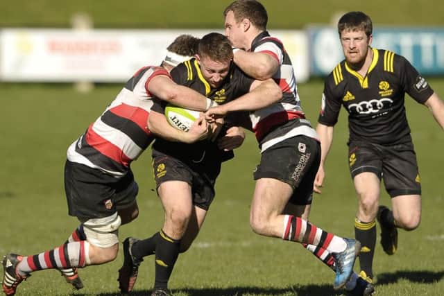 Russell Anderson cant find a way past Stirlings Alex Taylor and Chris Fusaroy. Picture: Neil Hanna
