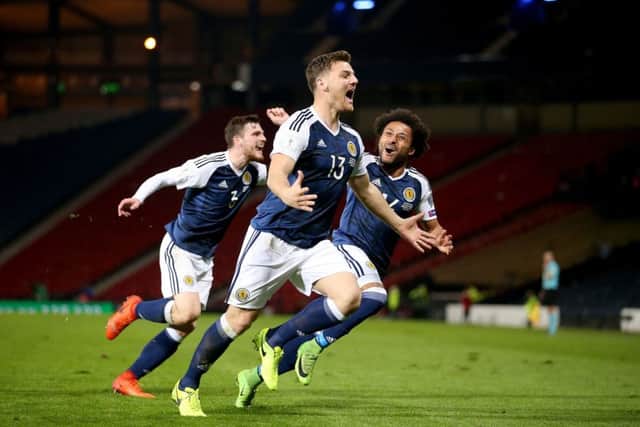 Chris Martin celebrates scoring the winning goal. Picture: PA