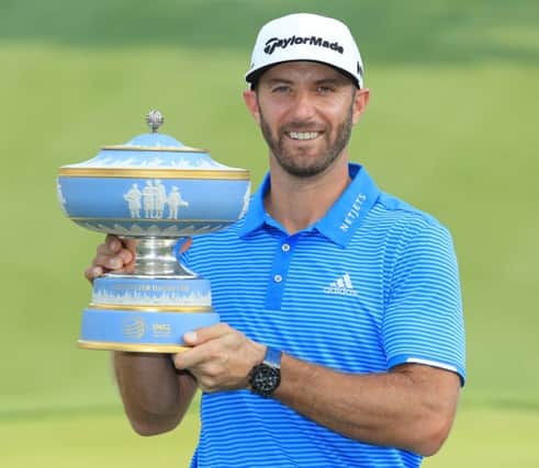 Dustin Johnson shows off the WGC-Dell Technologies Match Play trophy after his win in Texas. Picture: Getty Images