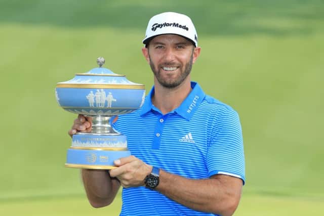 Dustin Johnson, with the WGC Dell Match Play trophy, is beginning to look invincible. Picture: Getty.