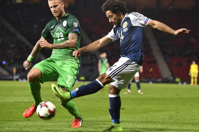 Ikechi Anya almost scored with his first touch against Slovenia. Picture: SNS.