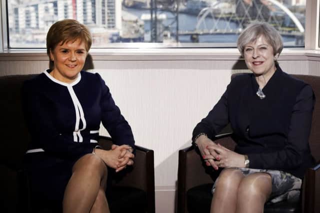 Prime Minister Theresa May meets with Scottish First Minister Nicola Sturgeon in Glasgow. Picture: Russell Cheyne/Getty Images