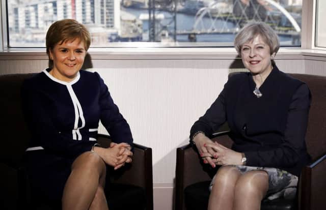 Prime Minister Theresa May meets with Scottish First Minister Nicola Sturgeon in Glasgow. Picture: Russell Cheyne/Getty Images