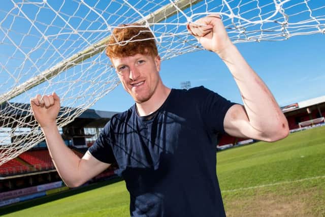 Simon Murray hopes the Irn Bru Cup win will revive Dundee United's promotion bid. PictureL: SNS.