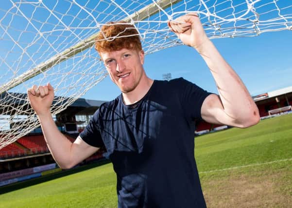Simon Murray hopes the Irn Bru Cup win will revive Dundee United's promotion bid. PictureL: SNS.