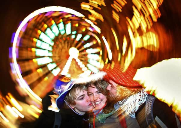 Hogmanay in Edinburgh, with its party atmosphere, now bears very little resemblance to the spartan event that took place every year not so long ago. Picture: Getty Images