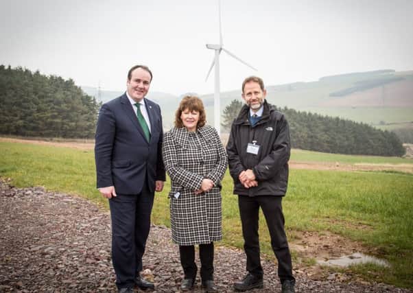 Energy minister Paul Wheelhouse with Helen Forsyth and Nicholas Gubbins