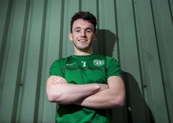 Hibernian's John McGinn missed the win over Falkirk because he was on Scotland duty. Picture: Paul Devlin/SNS