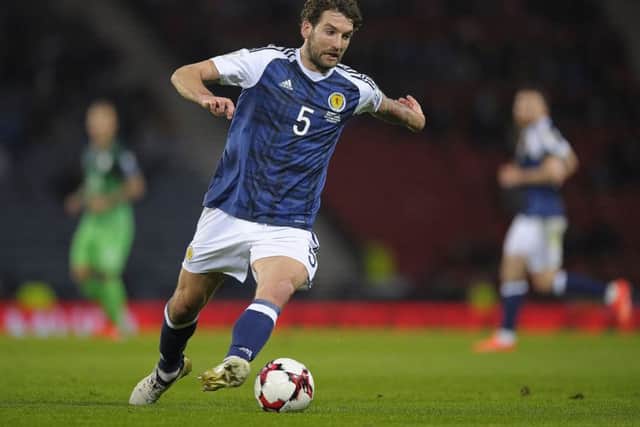 Charlie Mulgrew brought as assuredness to Scotlands defence against Slovenia. Picture: AFP/Getty