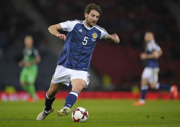 Charlie Mulgrew brought as assuredness to Scotlands defence against Slovenia. Picture: AFP/Getty