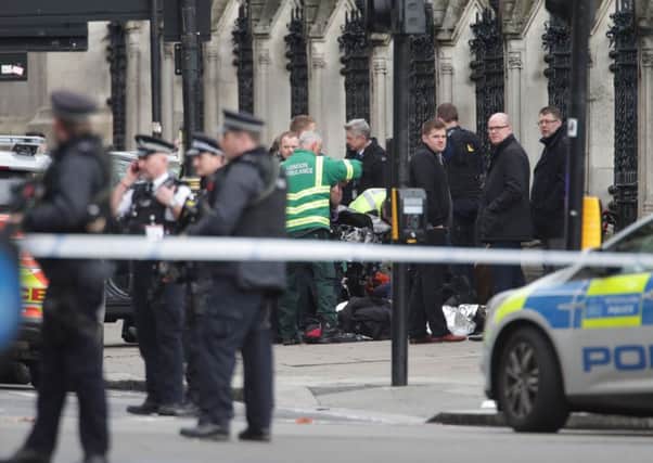 Emergency services close to the Palace of Westminster, where an unarmed police officer was killed last week.
