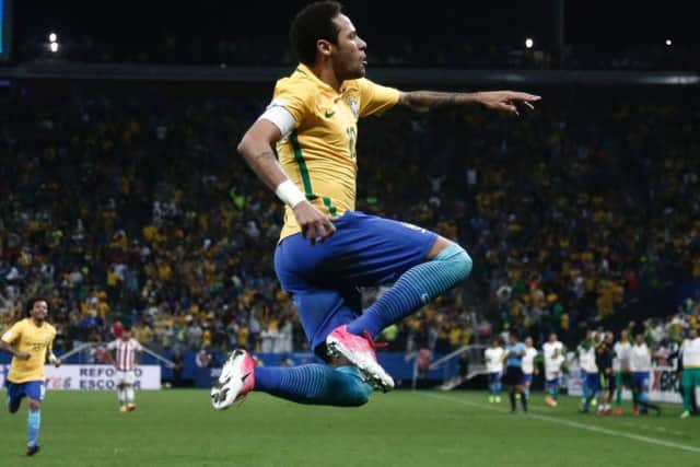 Brazil's forward Neymar celebrates after scoring in the 3-0 win against Paraguay in Sao Paulo. Picture: Miguel Schincariol/AFP/Getty Images