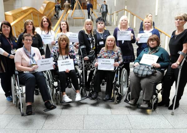 Mesh survivors protest over the independent review at the Scottish Parliament. Picture: Lisa Ferguson