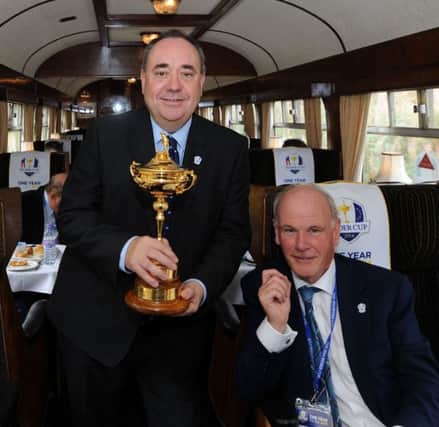 Sandy Jones, pictured with then First Minister Alex Salmond in the build up to the Gleneagles Ryder Cup, is confident the 2018 match will go ahead in France. Picture: Jane Barlow