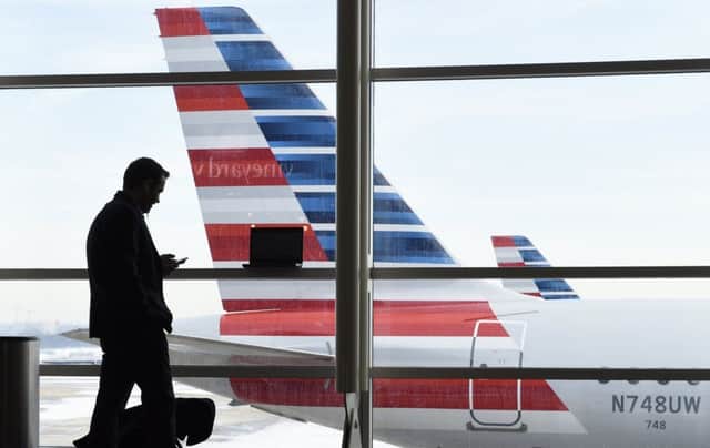 The Americans Airline plane was able to taxi to its gate safely where it was met by paramedics (AP Photo/Susan Walsh, File)