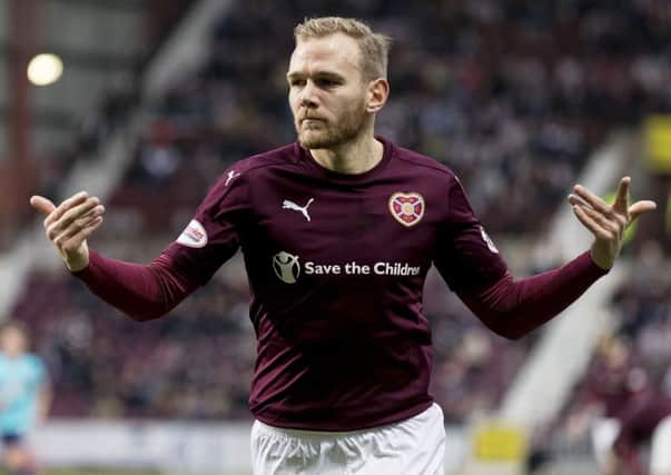 Malaury Martin sees no reason why Hearts cannoto end Celtics unbeaten domestic run. Picture: SNS