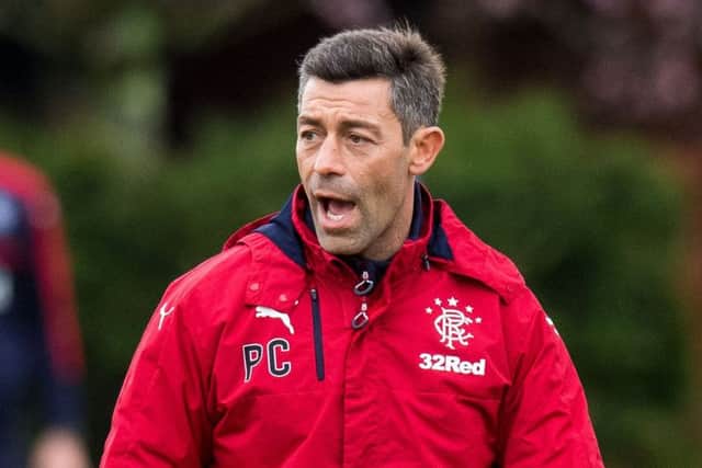 Rangers manager Pedro Caixinha issues instructions at training. Picture: SNS