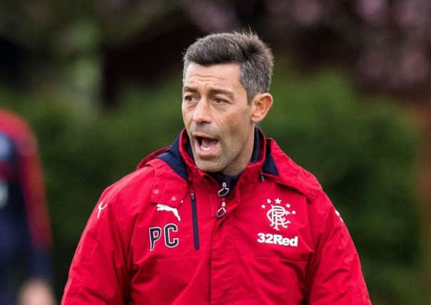 Rangers manager Pedro Caixinha issues instructions at training. Picture: SNS