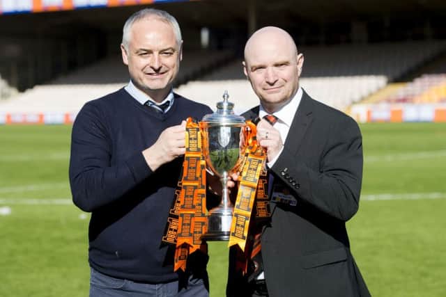 Chairman Stephen Thompson celebrates
Dundee United's Irn Bru Cup win with manager Ray McKinnon, left. Picture: Craig Foy/SNS
