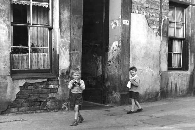 Deprivation of the kind once seen in the Gorbals is a thing of the past, but statistics show that the life chances of Scots today are far from equal. Picture: B Marshall/Getty