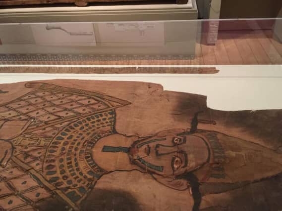 The mummy shroud was discovered in a museum store more than 80 years after it was wrapped up in brown paper.