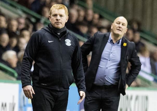 Morton boss Jim Duffy, right, and Neil Lennon before their touchline bust-up on Wednesday night. Picture: Ross MacDonald/SNS
