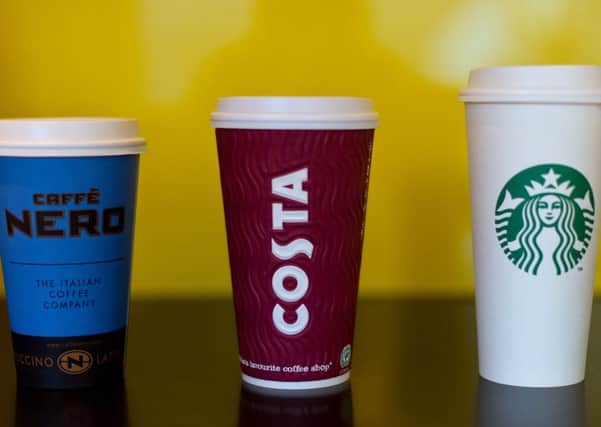 Even a small charge for a coffee cup would make a big difference to the amount of resource wasted in their production. Picture: Getty Images