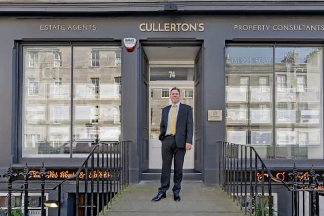 Mark Cullerton outside his new estate agents and property consultants office in St Stephen Street, Edinburgh.