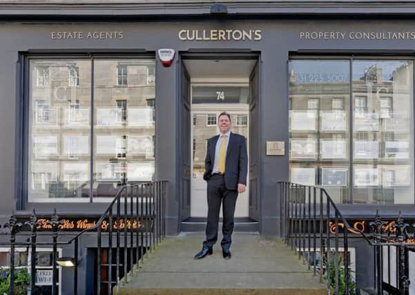 Mark Cullerton outside his new estate agents and property consultants office in St Stephen Street, Edinburgh.